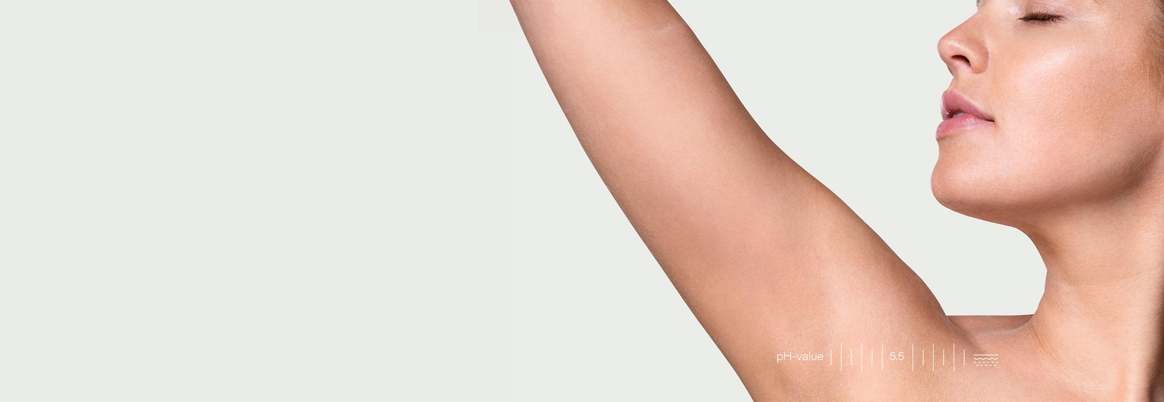 Woman's arm and face with pH value indicator