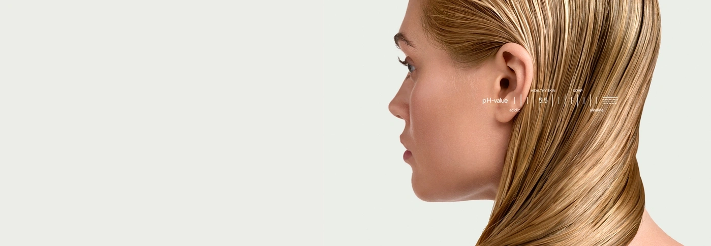 Profile of a woman with information on skin and hair pH value.