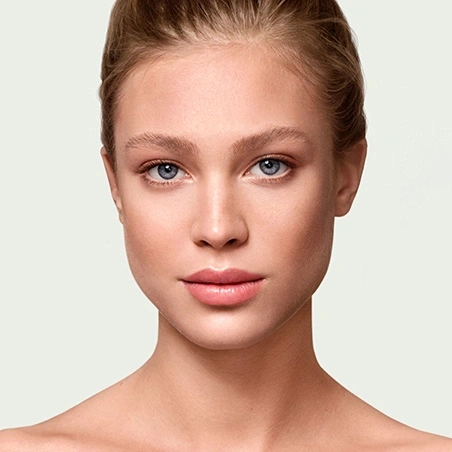 Portrait of a young woman with blue eyes and fair complexion