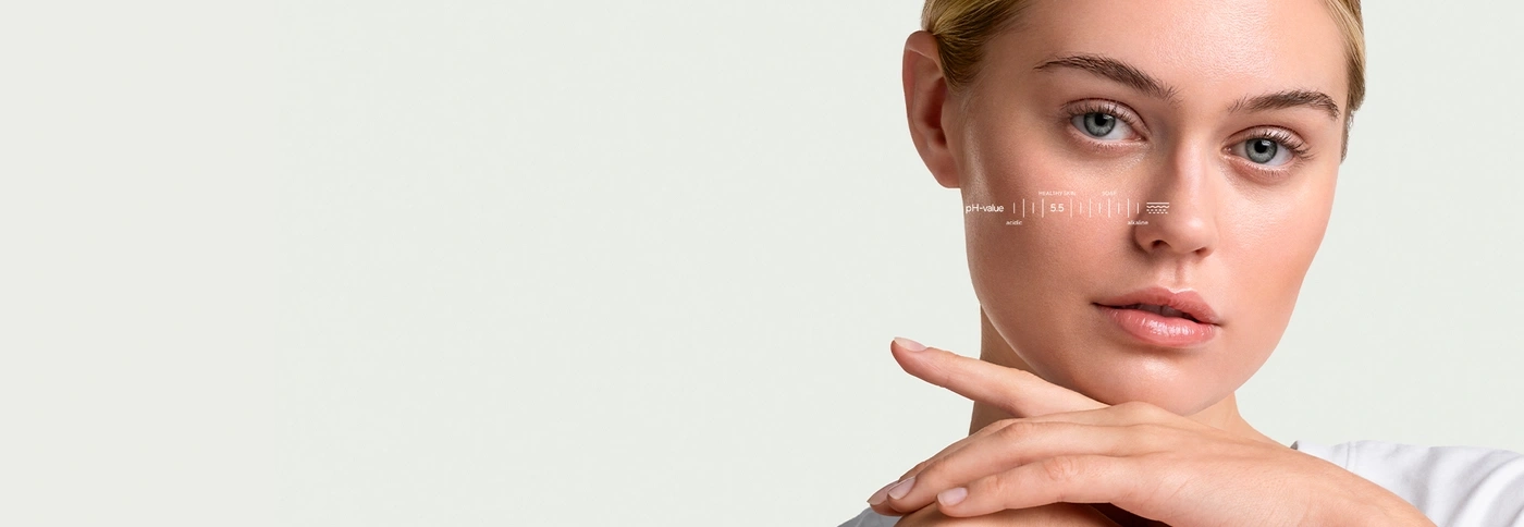 A woman with a pH value chart overlaid on her skin.