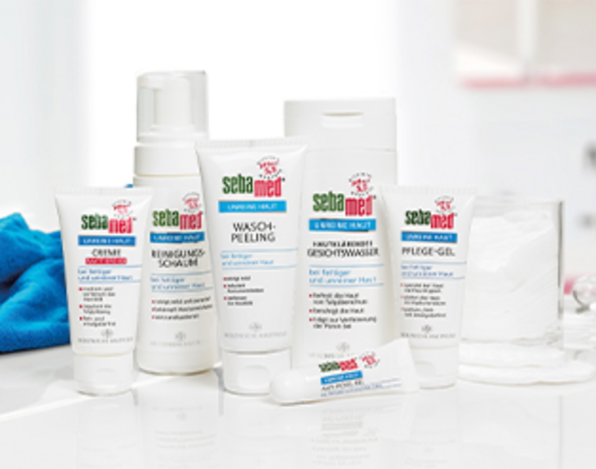 Sebamed skincare products on a table, ready for use and application.