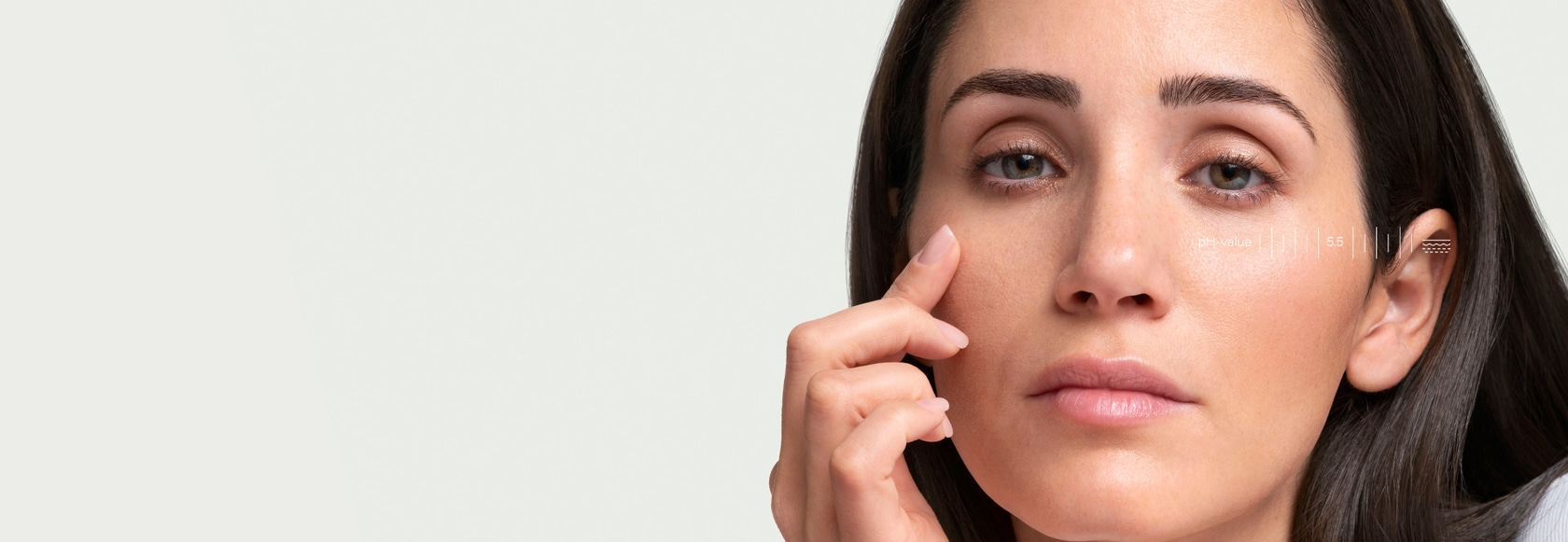 Woman touching face, pH value 5.5, skincare, beauty, wellness, healthy skin