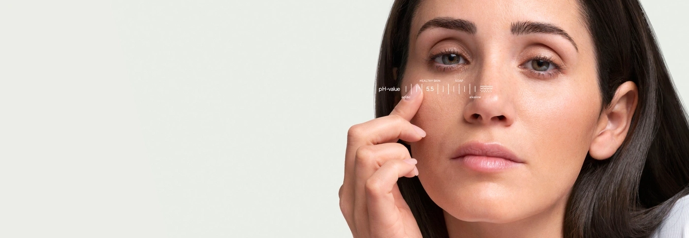 A woman with a pH value chart overlaid on her skin.